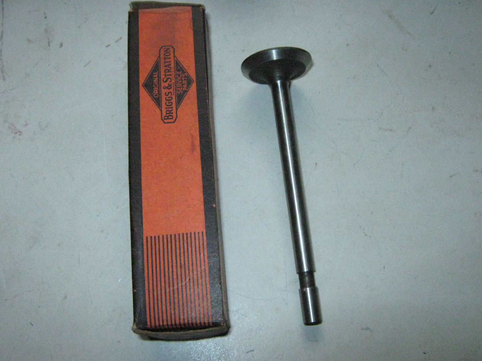 Briggs Exhaust Valve  63617  23638